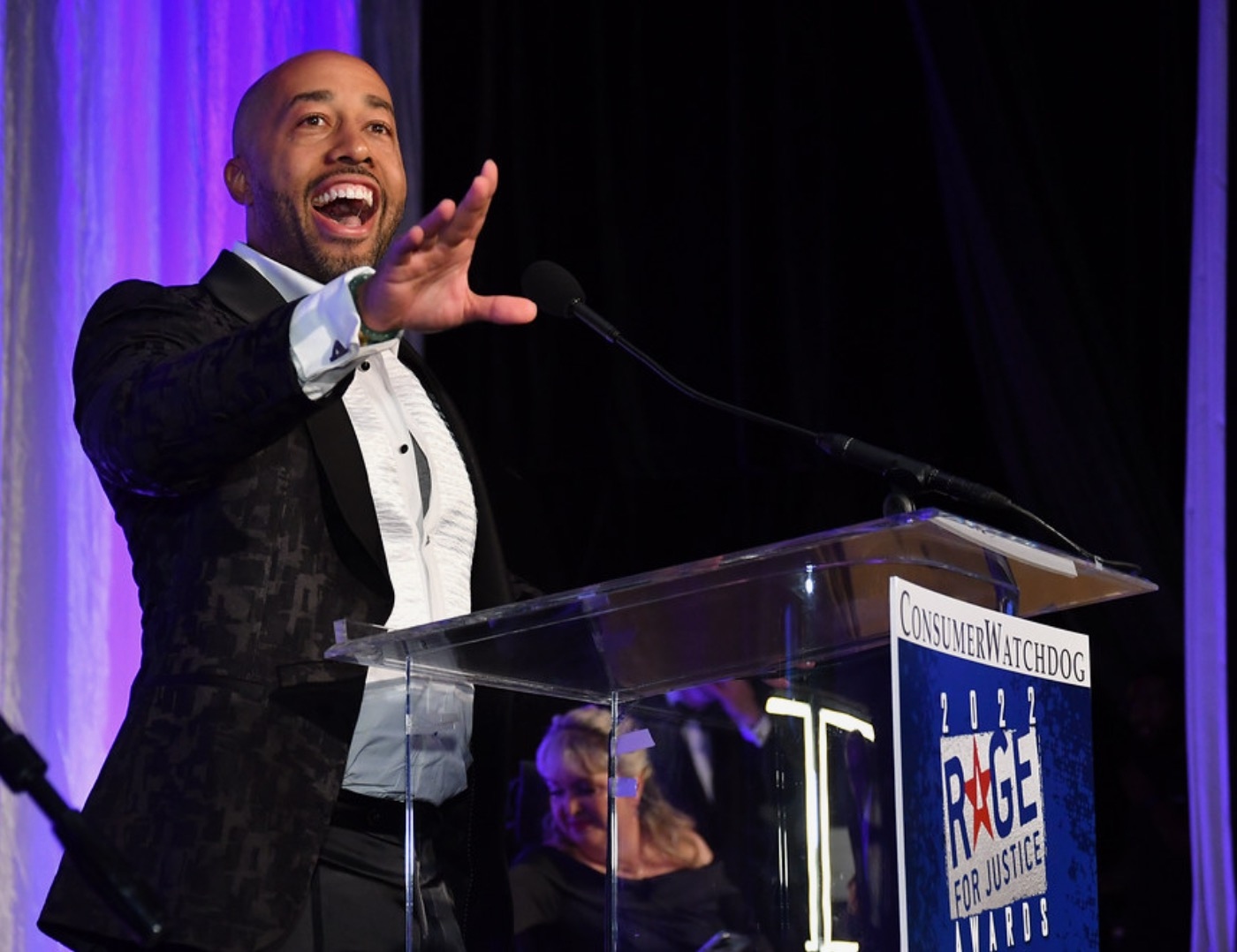 Charles speaking at Consumer Watchdog Rage for Justice Awards gala